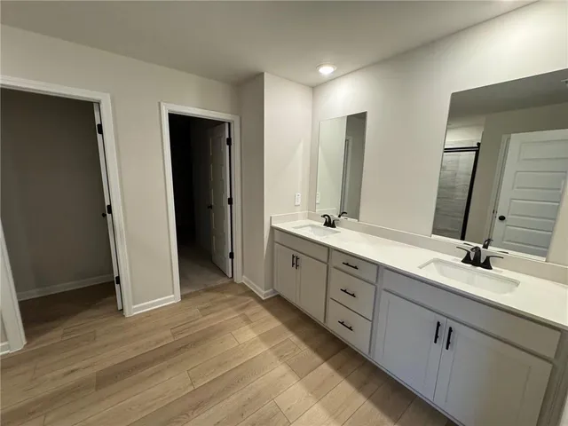a view of entryway with wooden floor