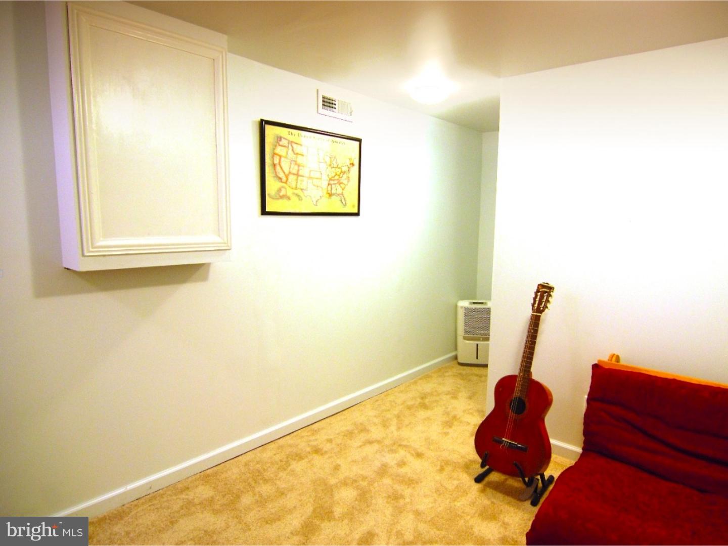 18 Shirley Road Hatboro, PA 19040 - Photo 18 of 24 a bed room with a bed and a window