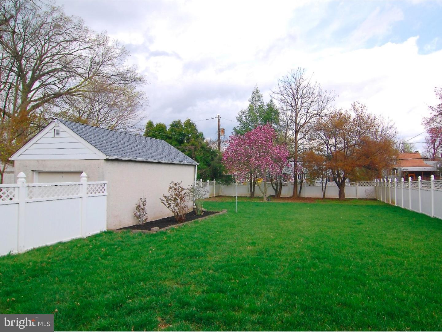 18 Shirley Road Hatboro, PA 19040 - Photo 23 of 24 a view of a backyard with plants and large trees
