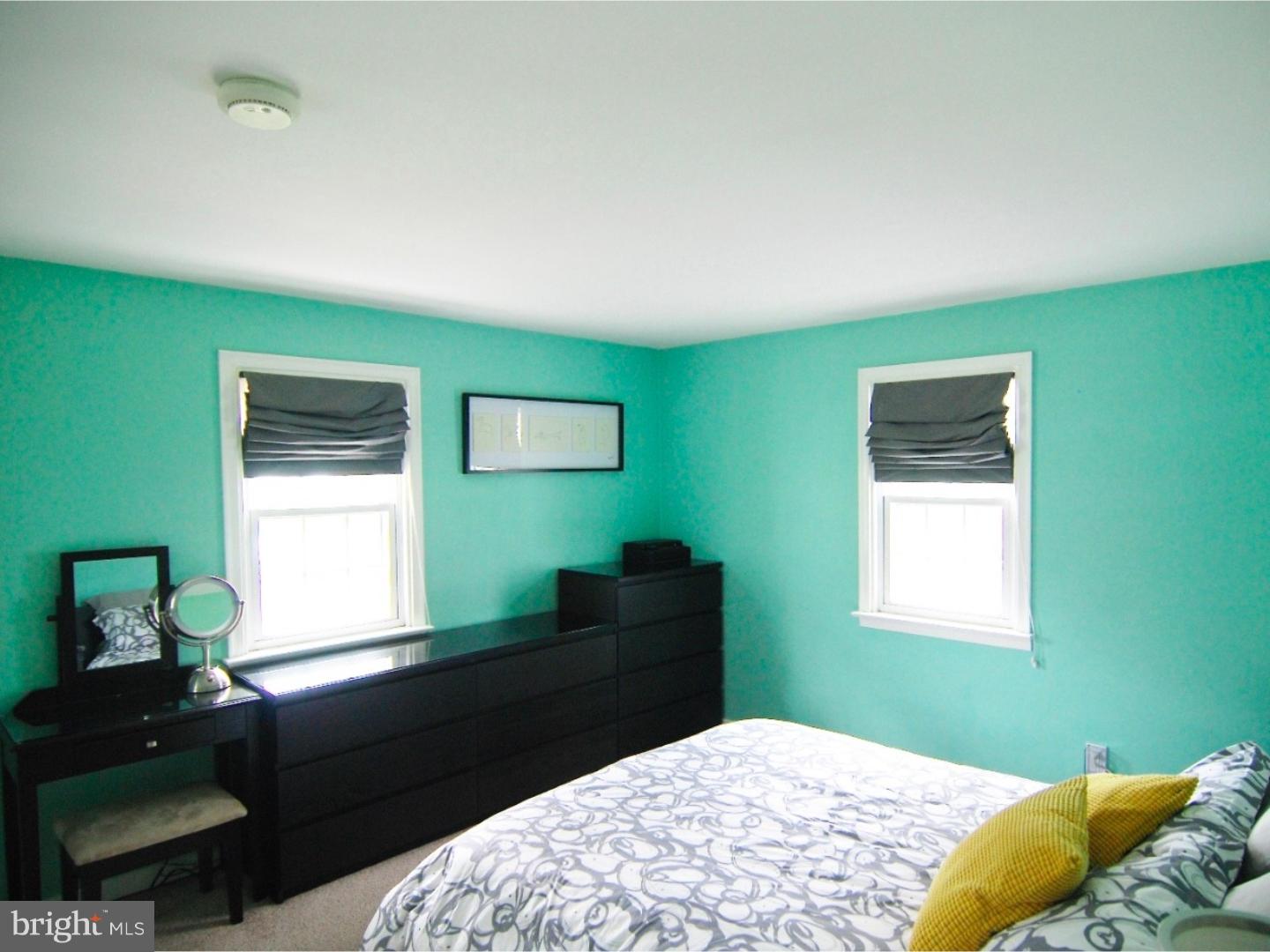 18 Shirley Road Hatboro, PA 19040 - Photo 9 of 24 a bedroom with a bed and a window