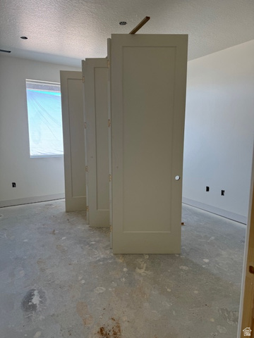 5005 North 75 East Enoch, UT 84721 - Photo 16 of 37 Bathroom with a textured ceiling and baseboards