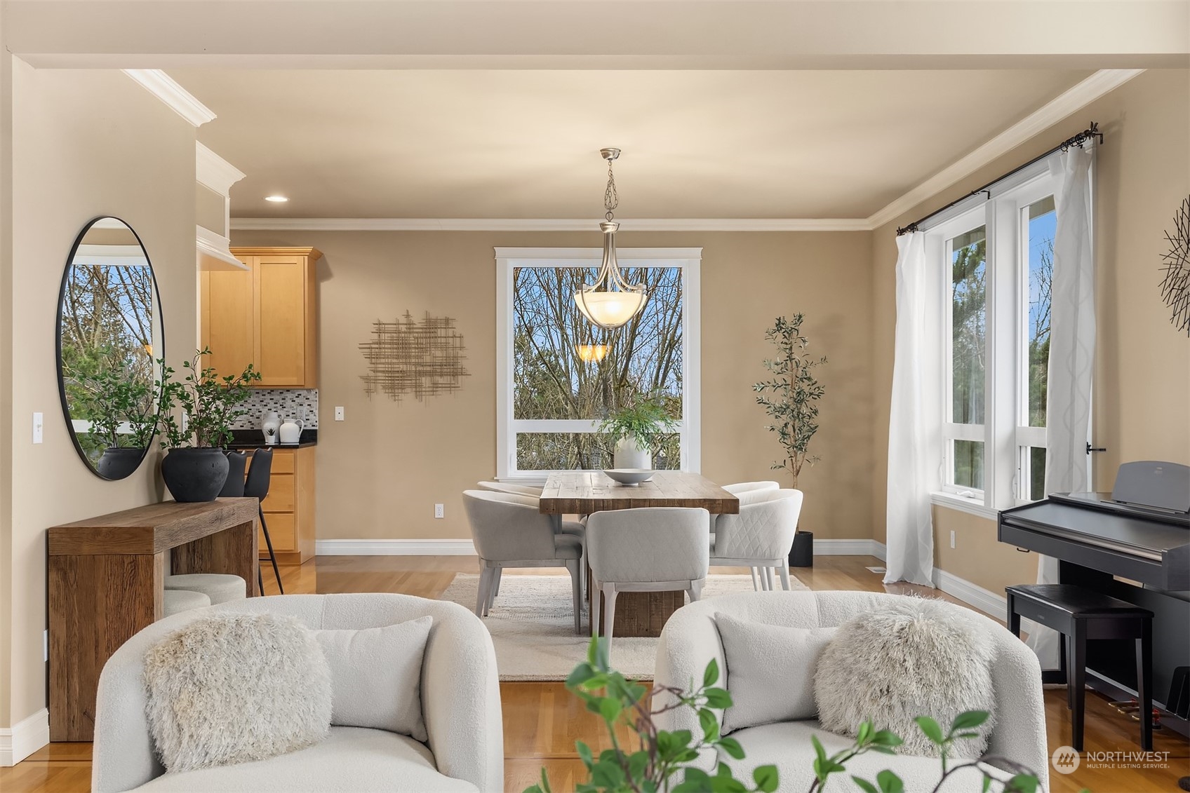 2202 19th Street Anacortes, WA 98221 - Photo 11 of 33 a living room with furniture a chandelier and a window