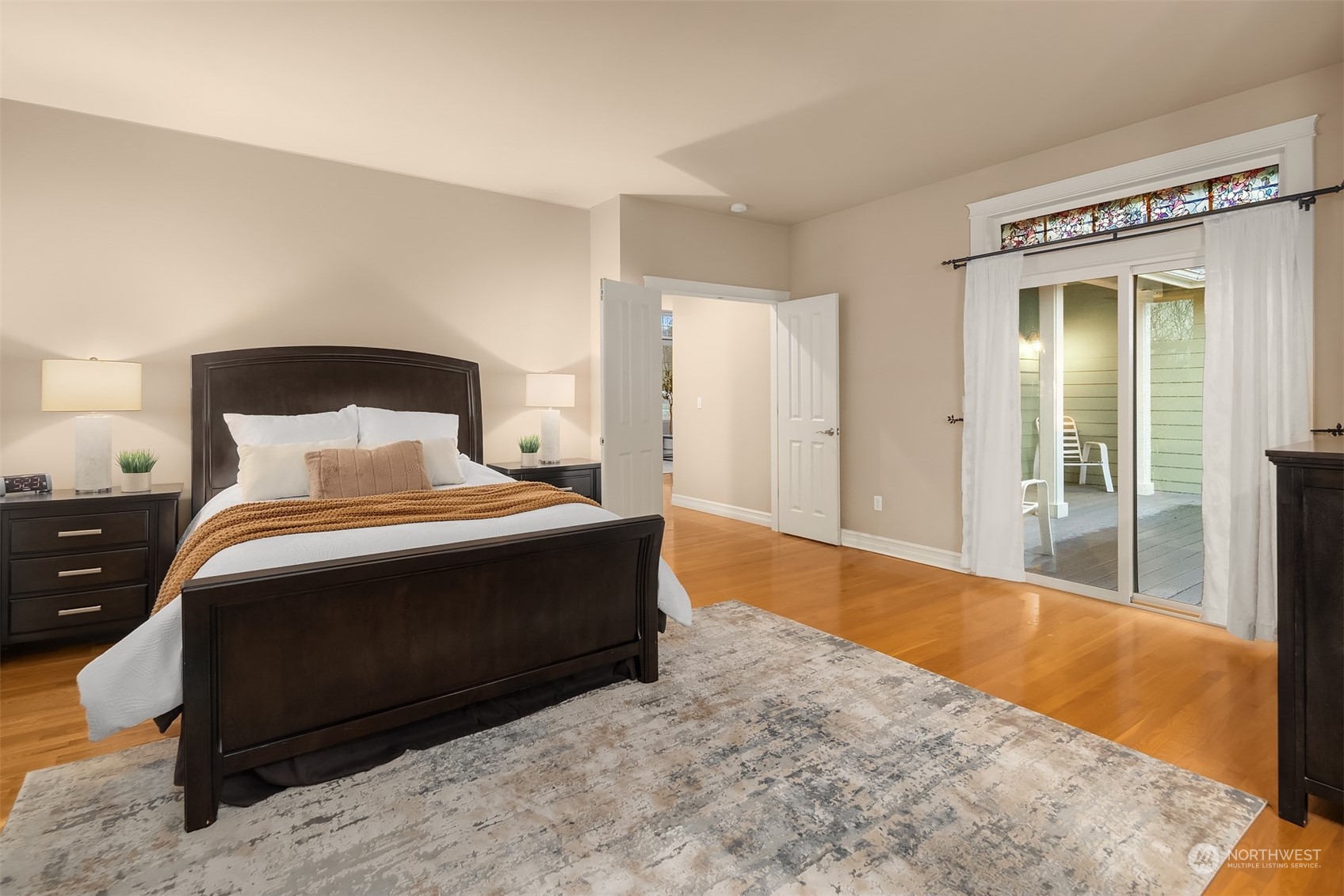 2202 19th Street Anacortes, WA 98221 - Photo 19 of 33 a bedroom with a bed and a large window