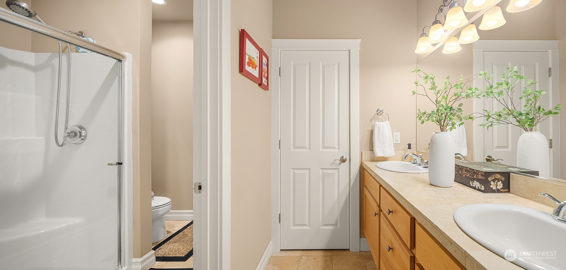 2202 19th Street Anacortes, WA 98221 - Photo 21 of 33 a bathroom with a sink a vanity and a mirror
