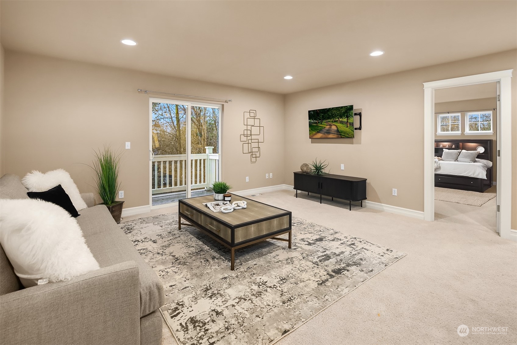 2202 19th Street Anacortes, WA 98221 - Photo 24 of 33 a living room with furniture and a flat screen tv