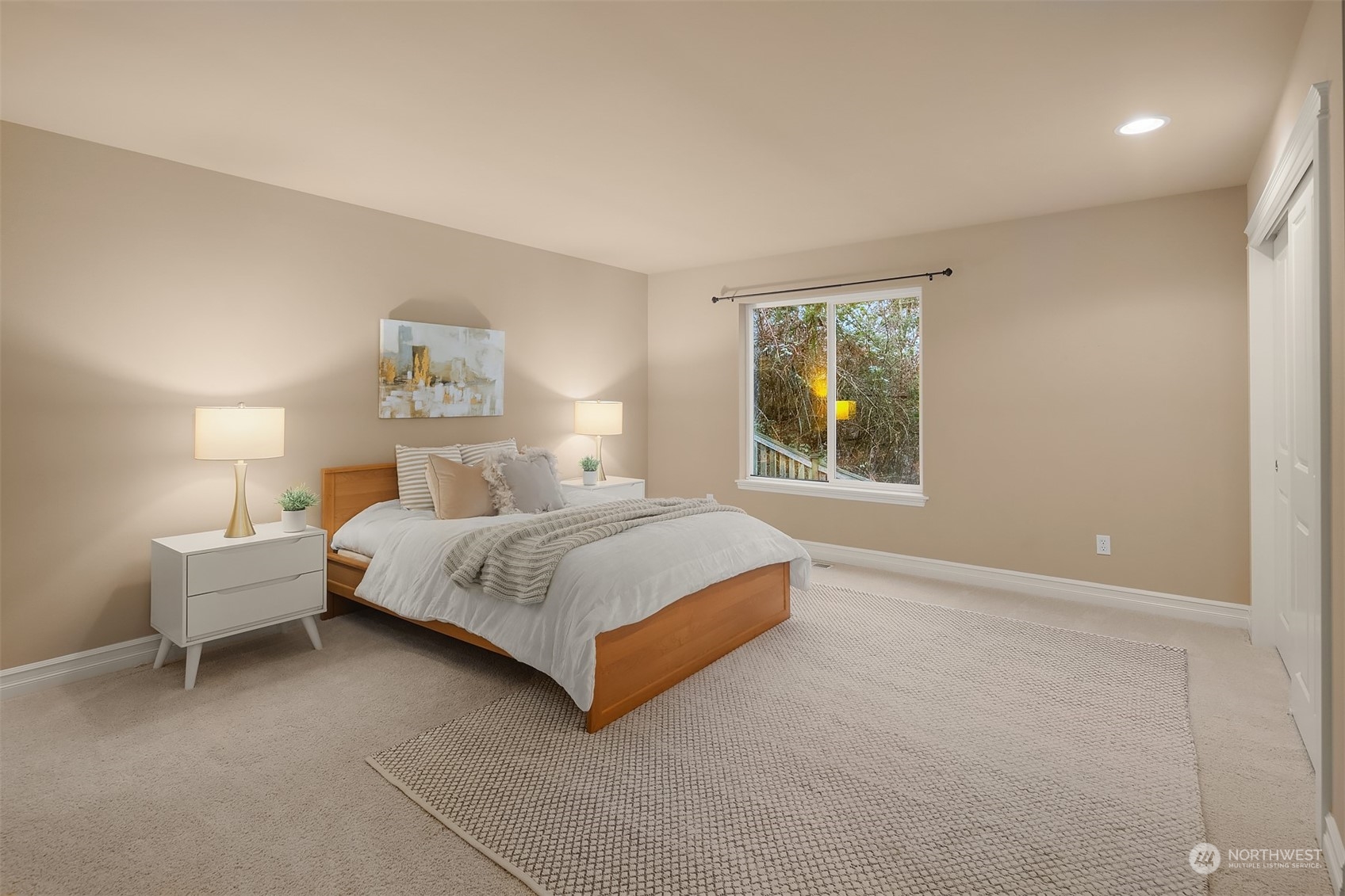 2202 19th Street Anacortes, WA 98221 - Photo 25 of 33 a bedroom with a bed and a window