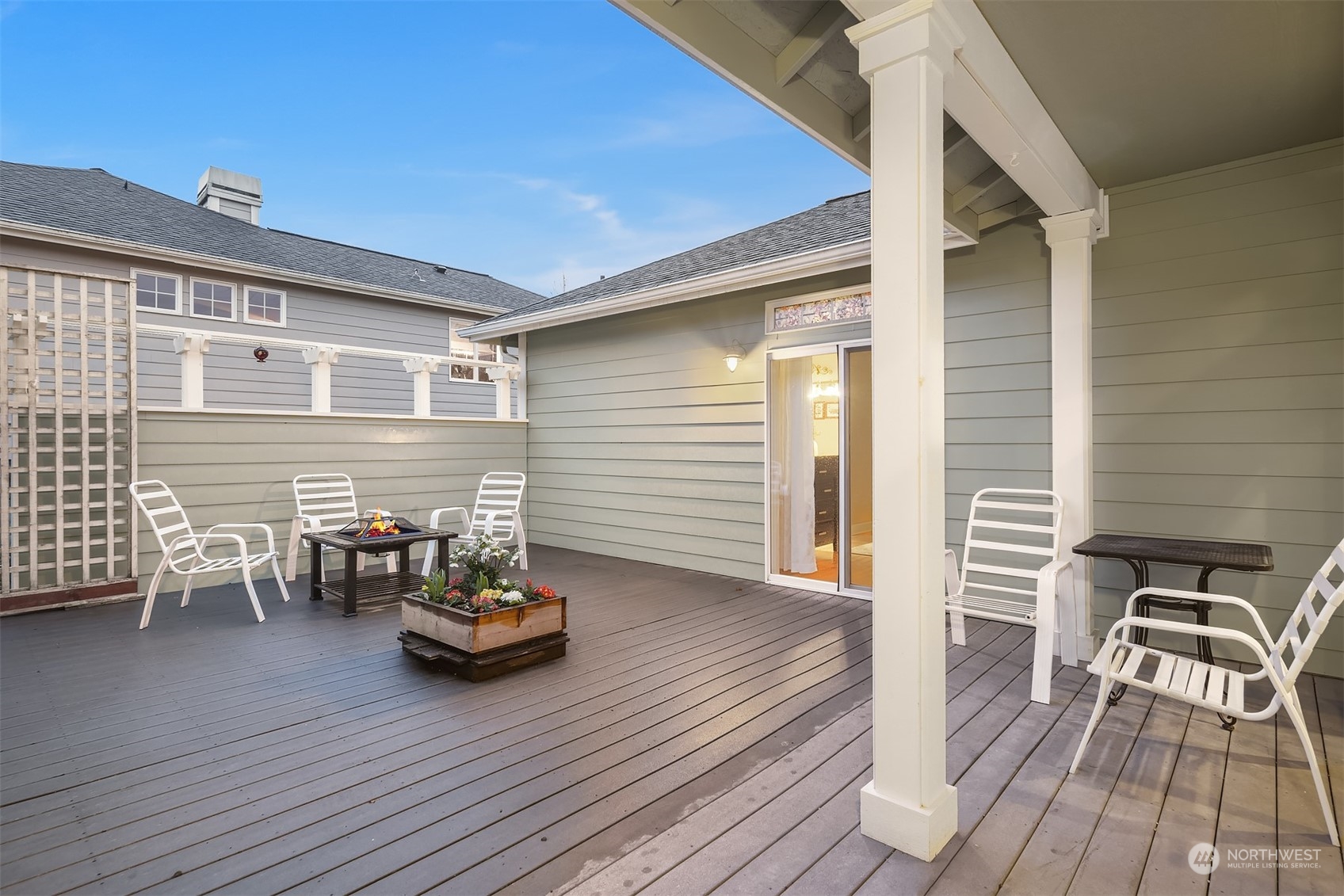 2202 19th Street Anacortes, WA 98221 - Photo 29 of 33 a backyard of a house with wooden floor and outdoor seating