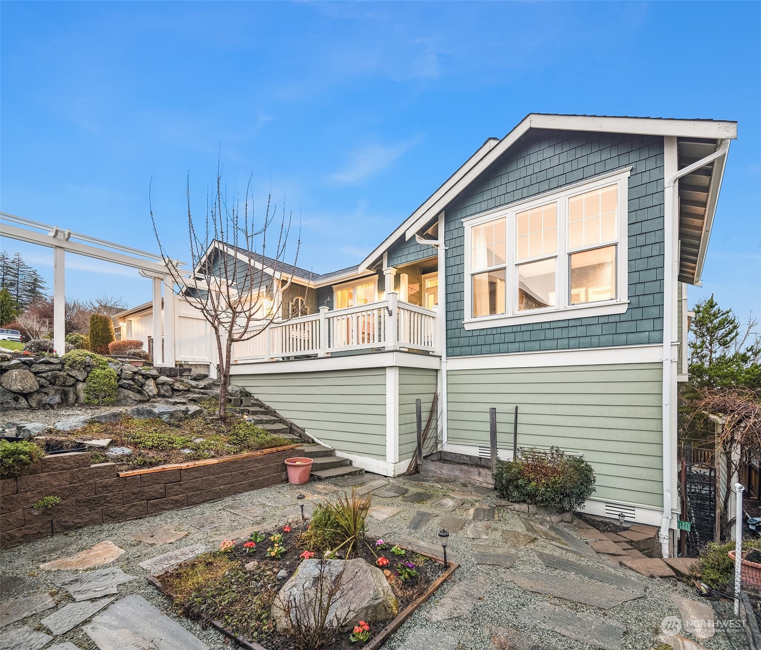 2202 19th Street Anacortes, WA 98221 - Photo 4 of 33 a front view of a house with garden