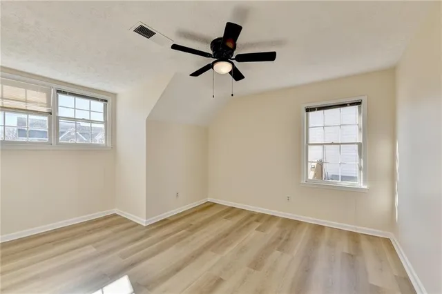 a view of an empty room and window