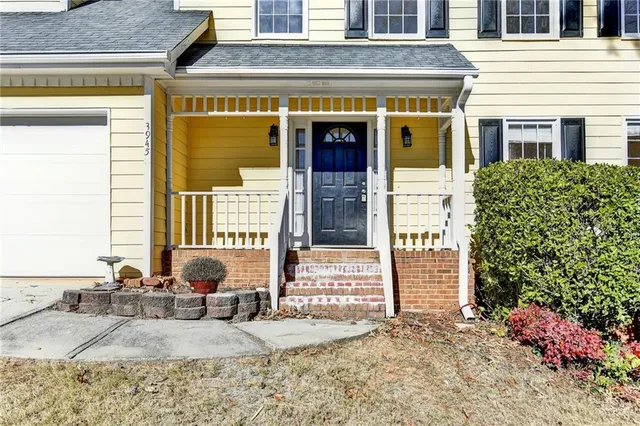a view of entryway with wooden floor