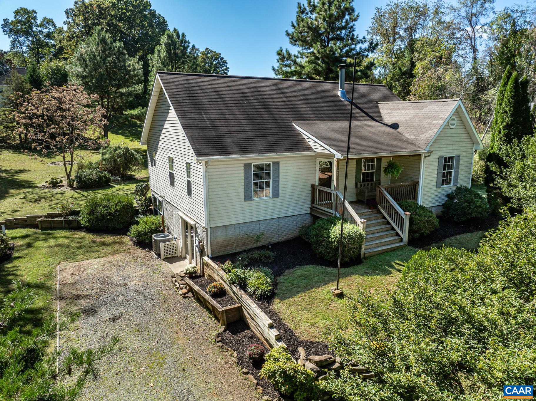 124 Fox Ridge Lane Ruckersville, VA 22968 - Photo 1 of 52 an aerial view of a house with garden