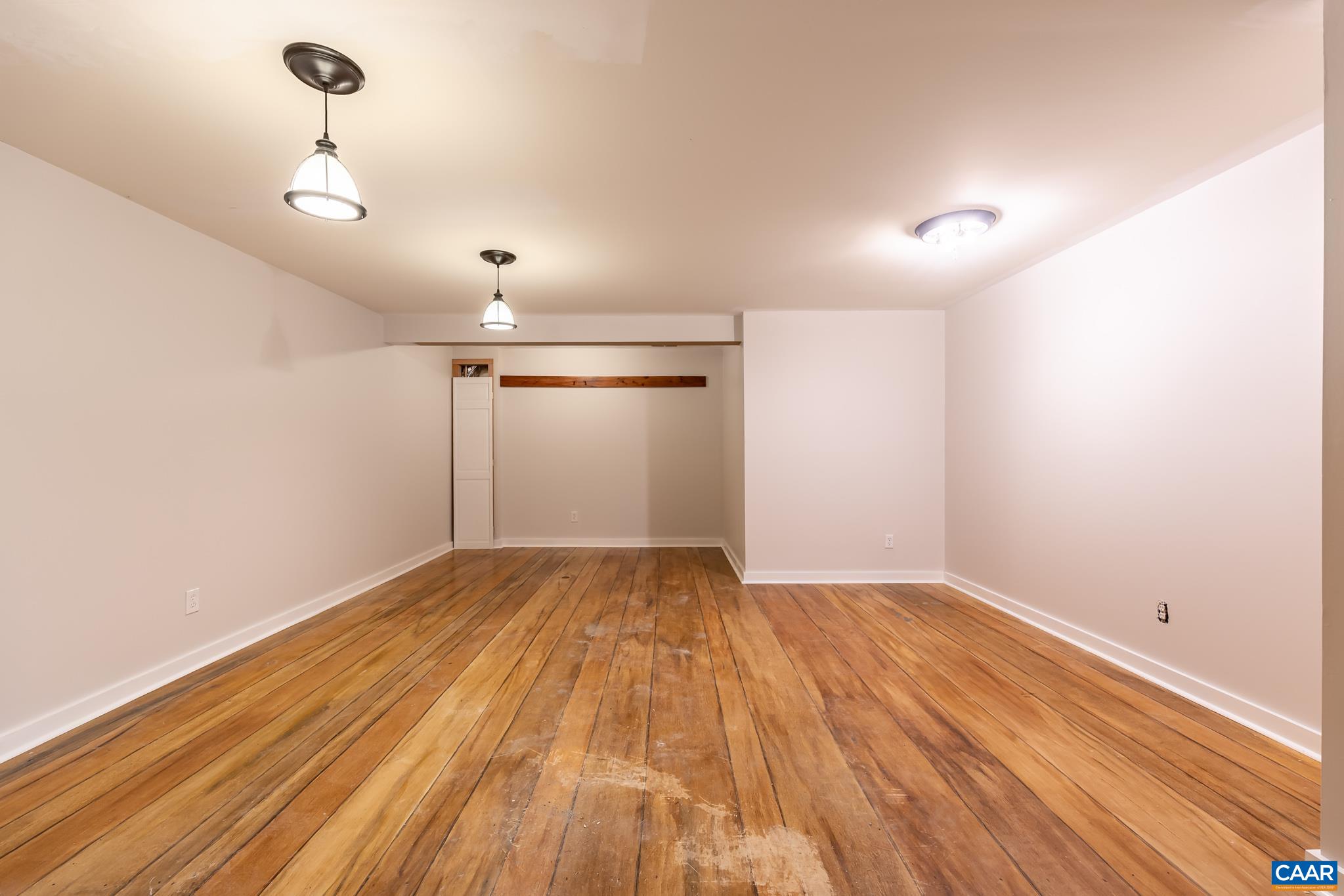 124 Fox Ridge Lane Ruckersville, VA 22968 - Photo 32 of 52 a view of empty room with wooden floor