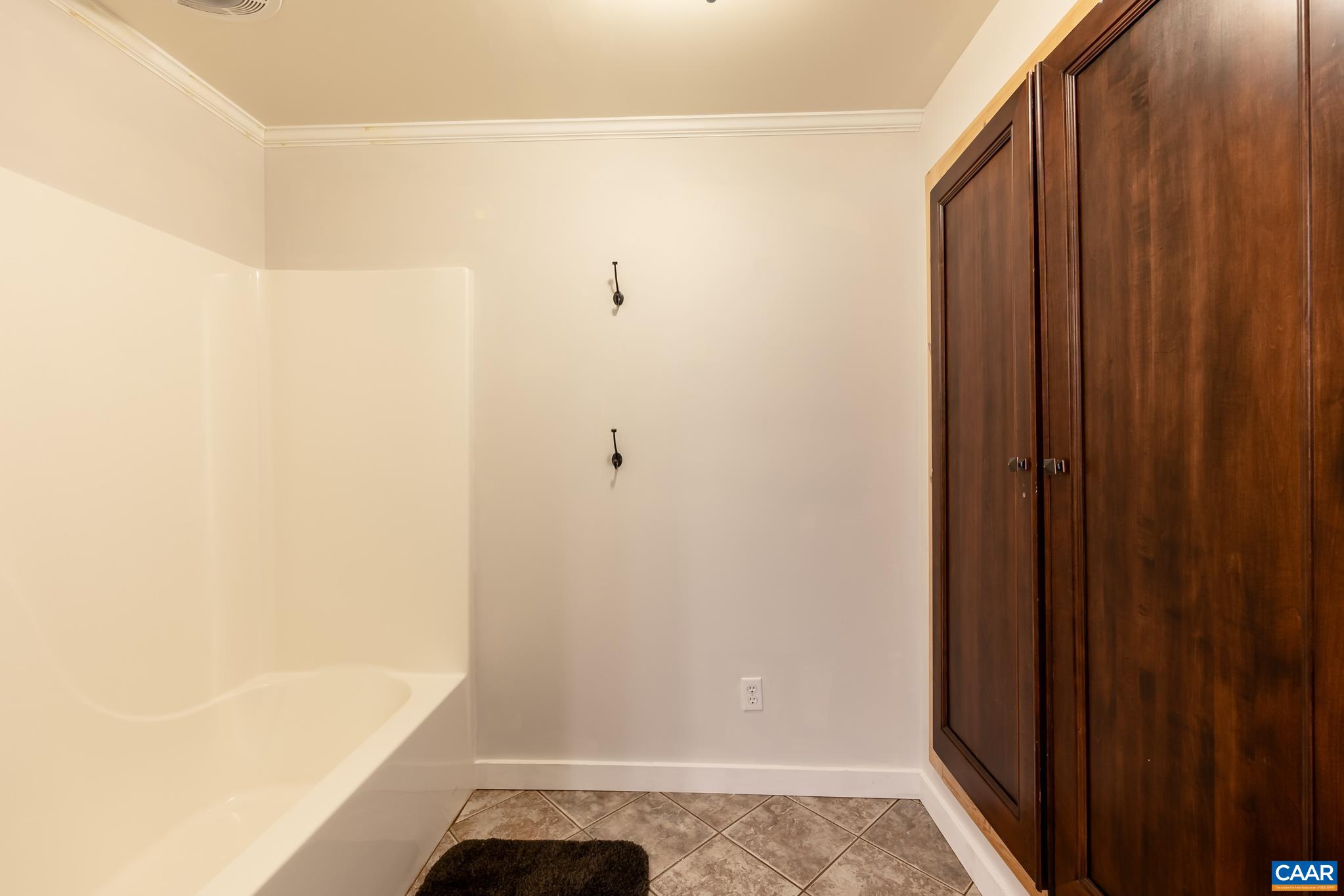 124 Fox Ridge Lane Ruckersville, VA 22968 - Photo 36 of 52 a bathroom with a bathtub