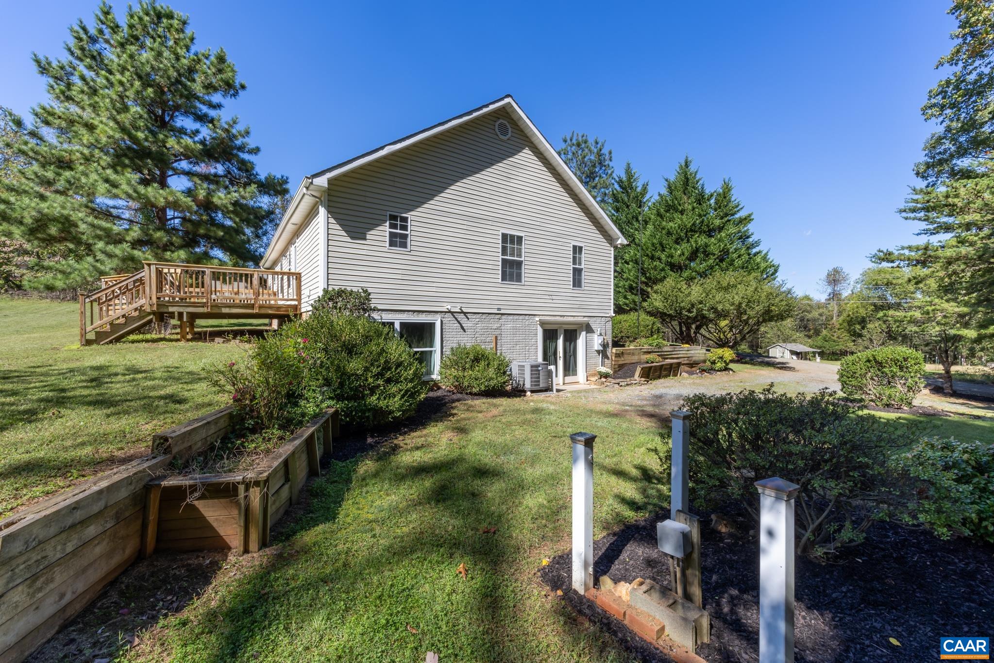 124 Fox Ridge Lane Ruckersville, VA 22968 - Photo 42 of 52 a view of a house with a yard and furniture