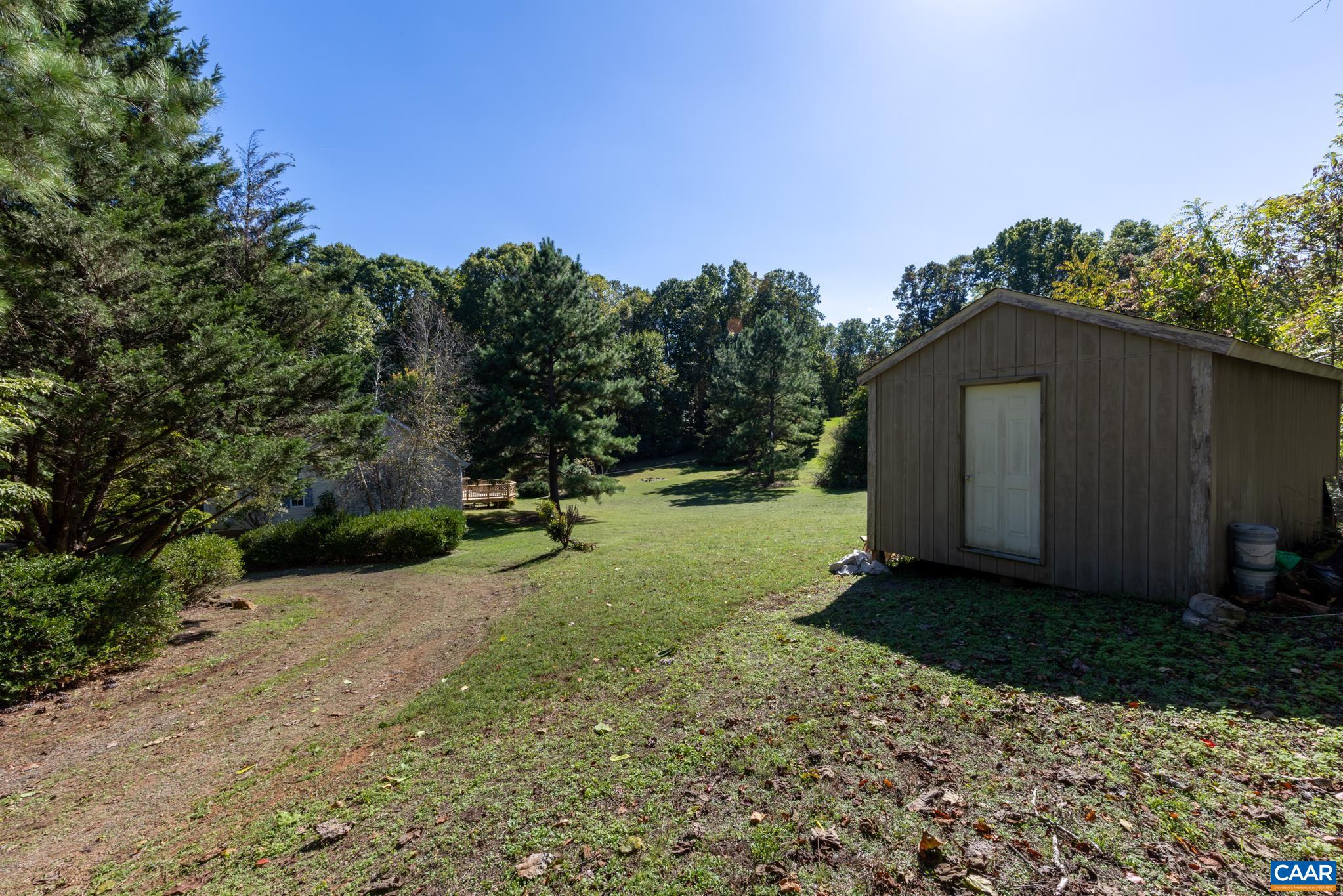 124 Fox Ridge Lane Ruckersville, VA 22968 - Photo 48 of 52 a backyard of a house with lots of green space