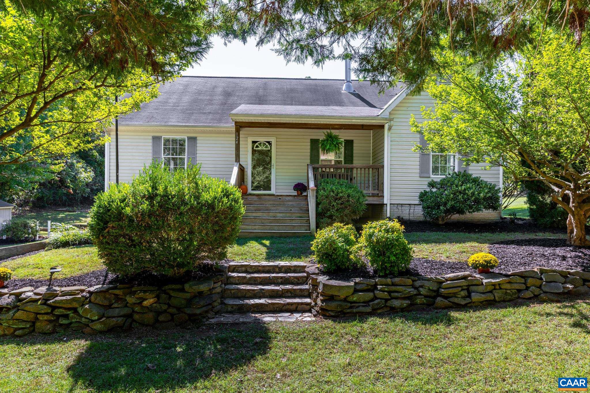 124 Fox Ridge Lane Ruckersville, VA 22968 - Photo 5 of 52 a front view of a house with garden