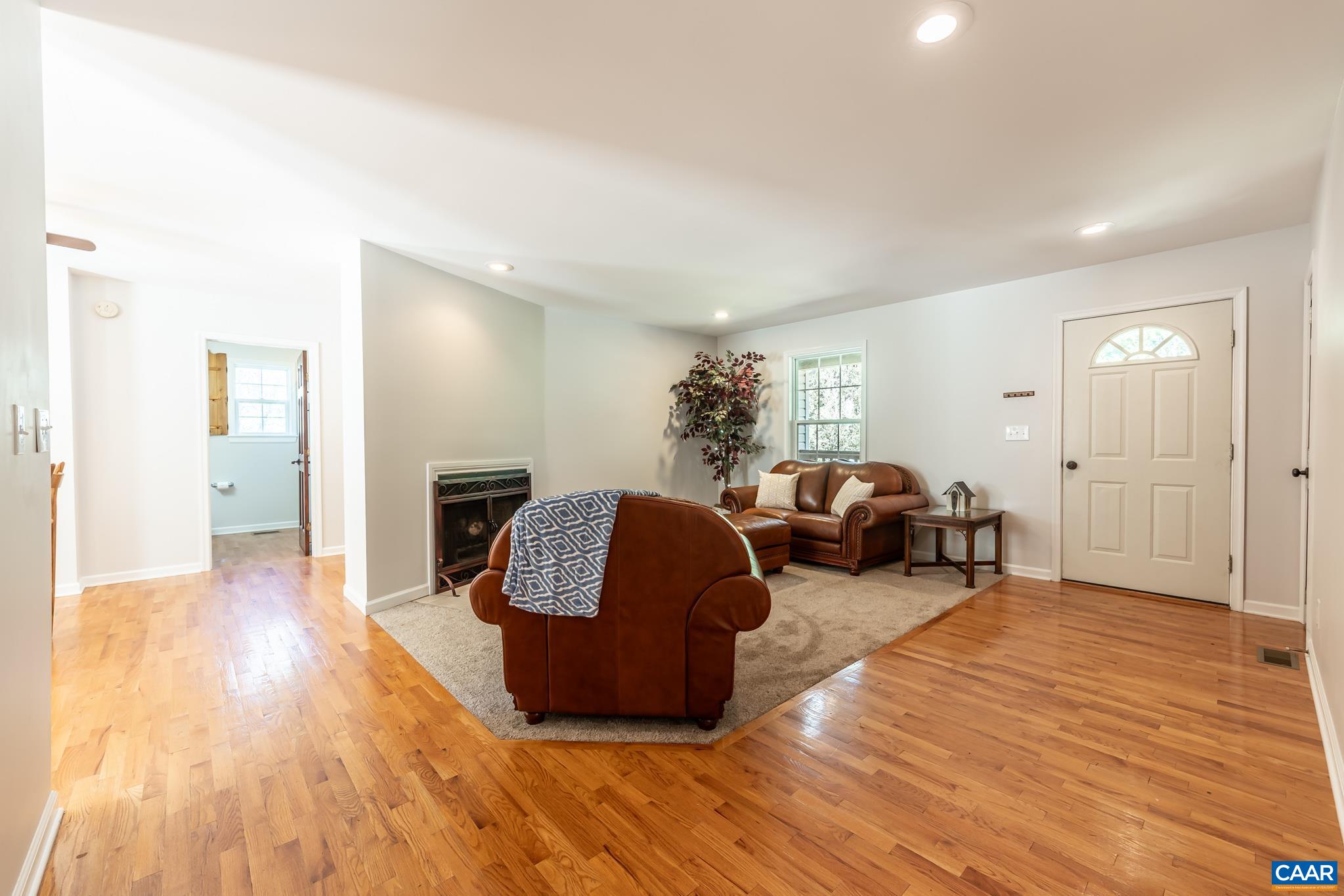 124 Fox Ridge Lane Ruckersville, VA 22968 - Photo 9 of 52 a spacious bedroom with a bed and wooden floor