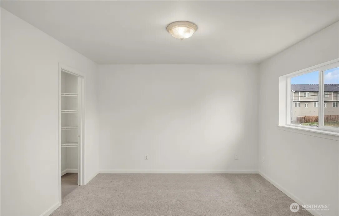 4050 South Puget Sound Avenue Tacoma, WA 98409 - Photo 15 of 19 an empty room with windows