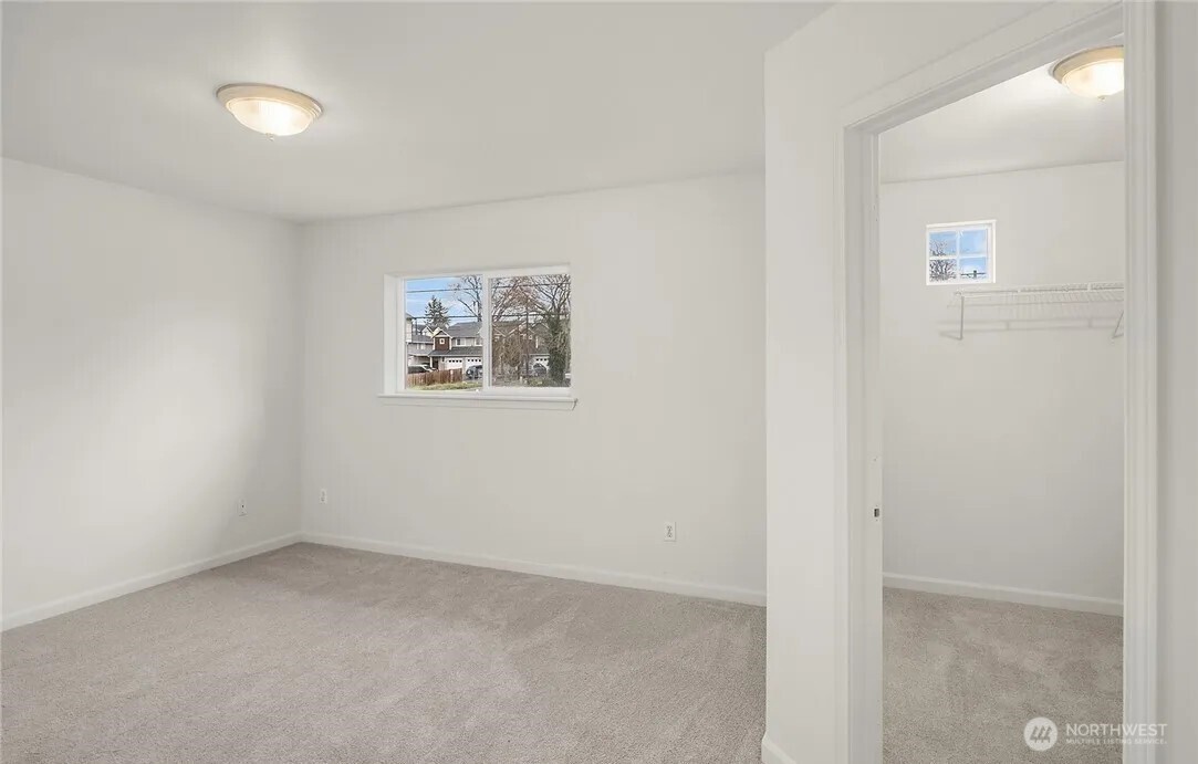 4050 South Puget Sound Avenue Tacoma, WA 98409 - Photo 16 of 19 an empty room with a window