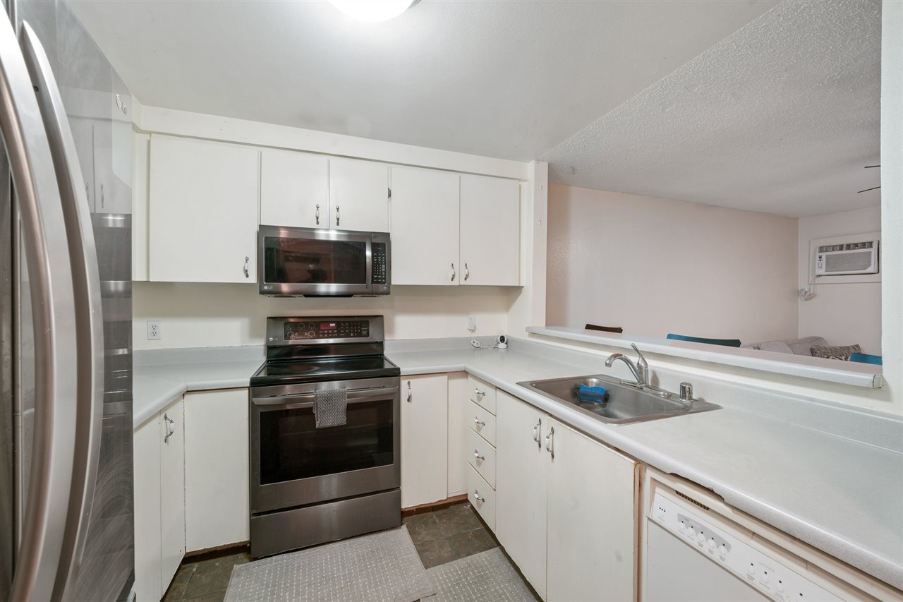 2747 South Kihei Road, Unit C005 Kihei, HI 96753 - Photo 14 of 29 a kitchen with a sink stove and refrigerator