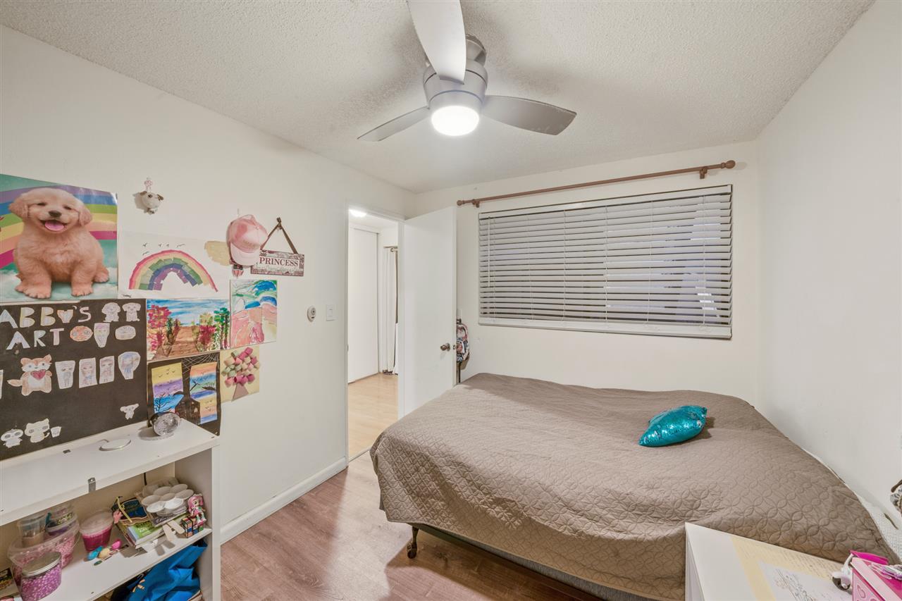 2747 South Kihei Road, Unit C005 Kihei, HI 96753 - Photo 18 of 29 a bedroom with a bed and a window