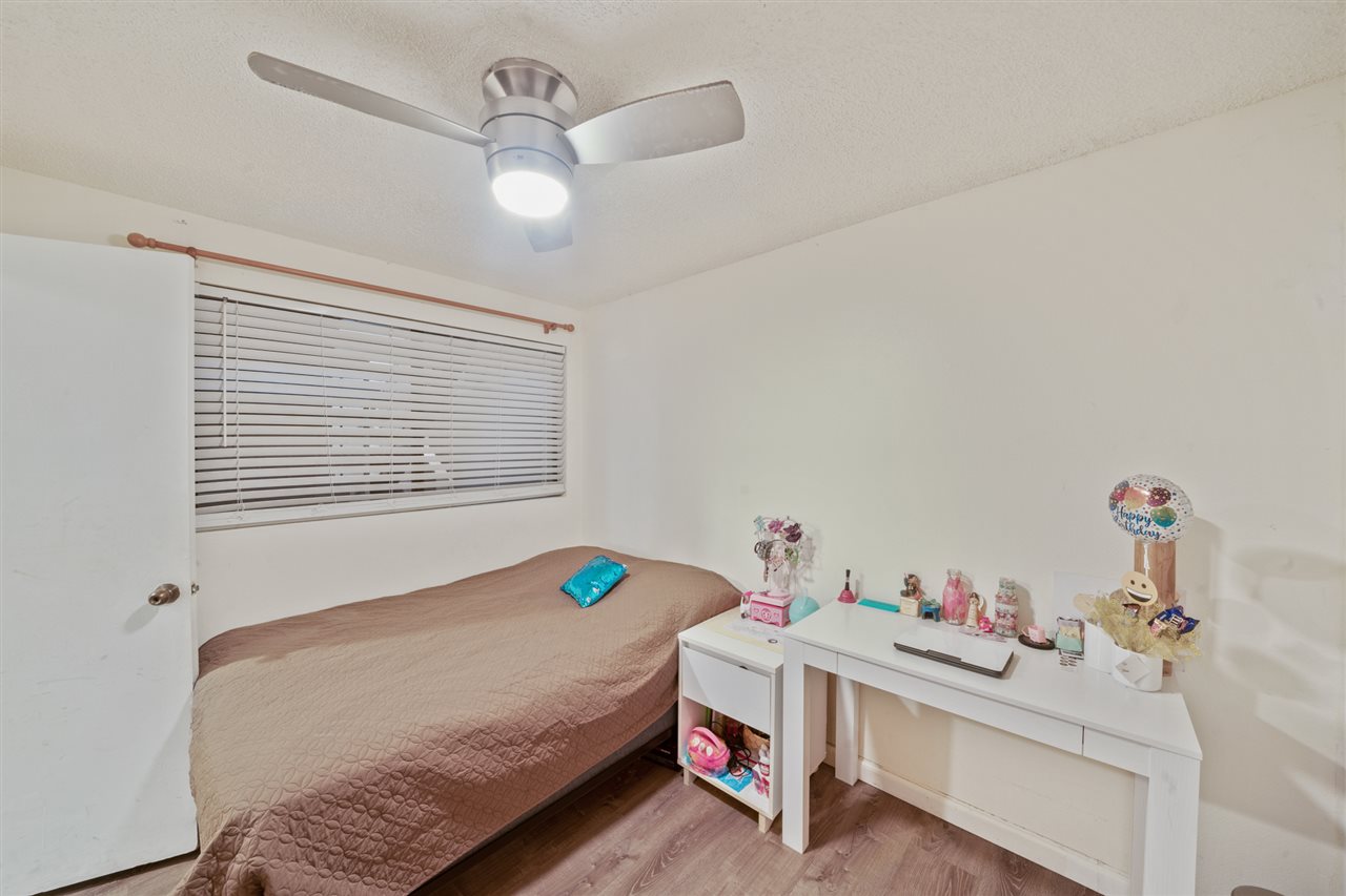 2747 South Kihei Road, Unit C005 Kihei, HI 96753 - Photo 19 of 29 a bedroom with a bed and a window