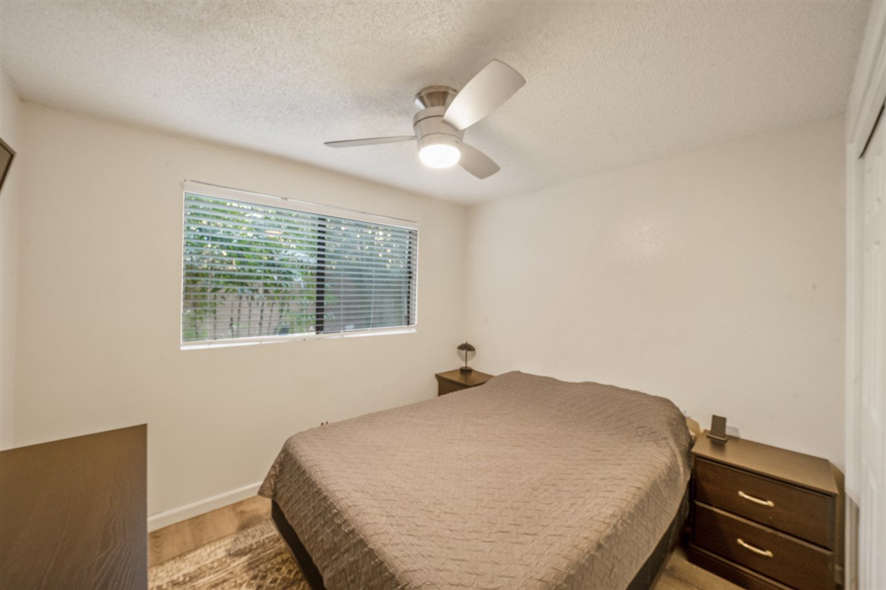 2747 South Kihei Road, Unit C005 Kihei, HI 96753 - Photo 23 of 29 a bedroom with a bed and a window