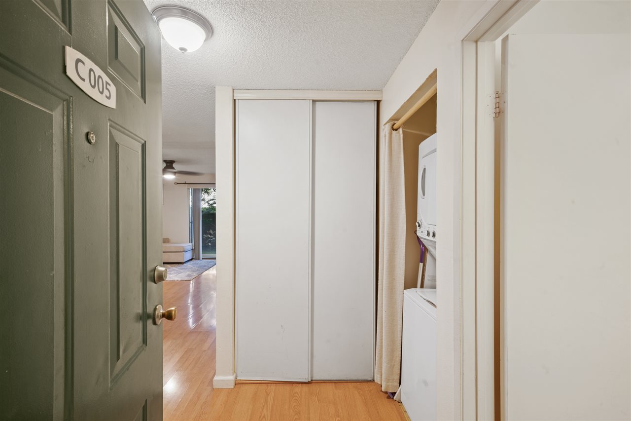 2747 South Kihei Road, Unit C005 Kihei, HI 96753 - Photo 9 of 29 a view of a hallway with wooden floor and a bathroom