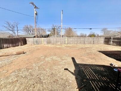 2802 40th Street Lubbock, TX 79413 - Photo 11 of 11 a view of a terrace with wooden floor and city view