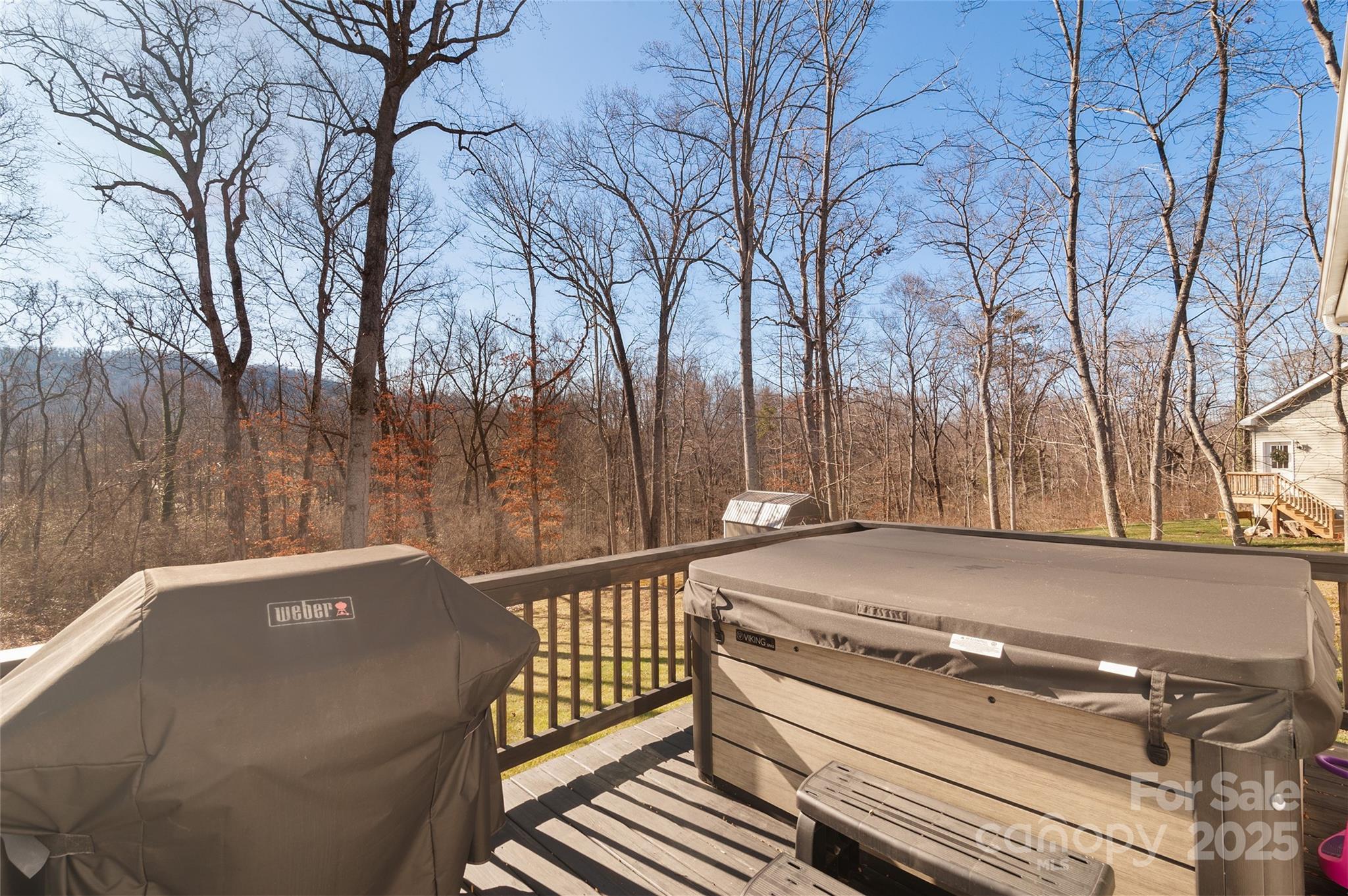 349 Ridge View Drive Clyde, NC 28721 - Photo 24 of 27 a view of a backyard with wooden fence