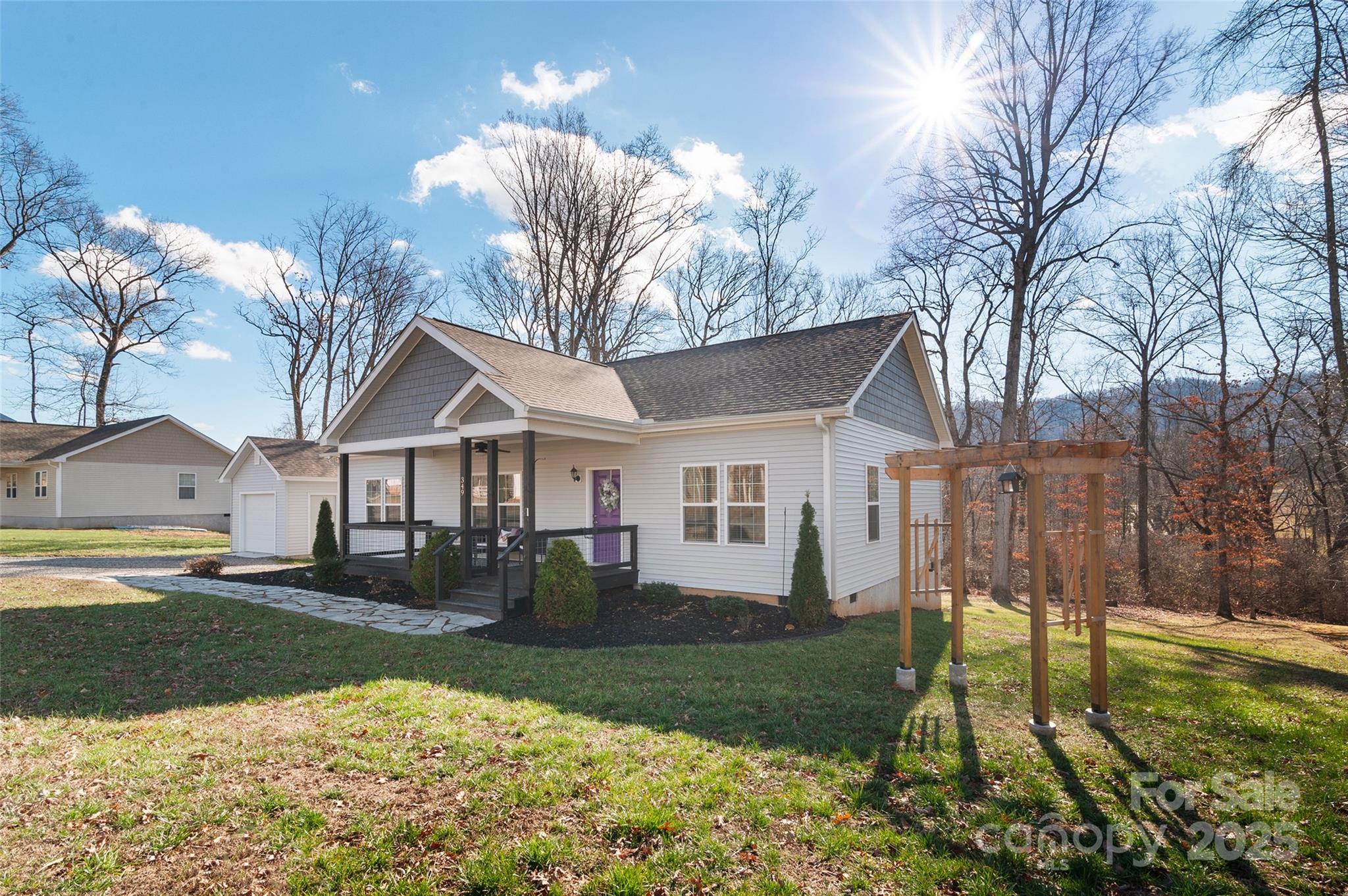 349 Ridge View Drive Clyde, NC 28721 - Photo 3 of 27 a front view of a house with a yard