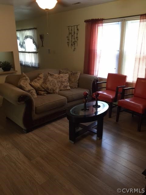 5418 South Jessup Road Chesterfield, VA 23832 - Photo 12 of 14 a living room with furniture and a large window