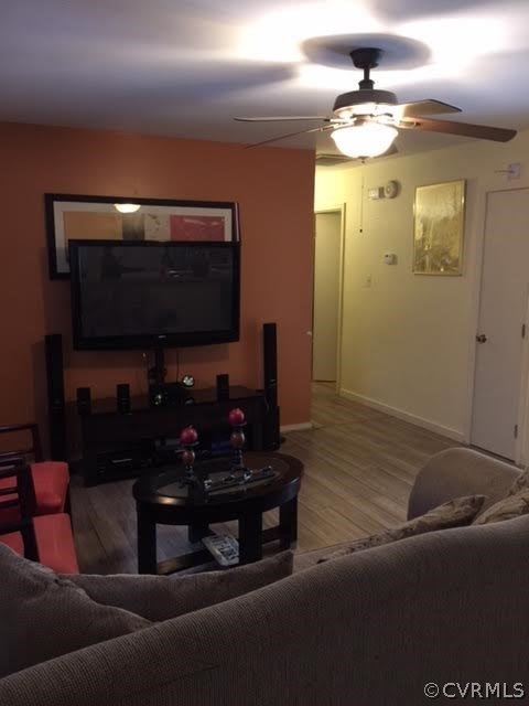 5418 South Jessup Road Chesterfield, VA 23832 - Photo 14 of 14 a living room with furniture and a flat screen tv