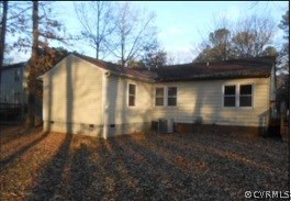 5418 South Jessup Road Chesterfield, VA 23832 - Photo 7 of 14 a backyard of a house with yard and outdoor seating