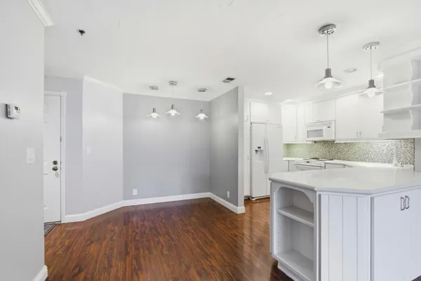 a view of a kitchen and a sink