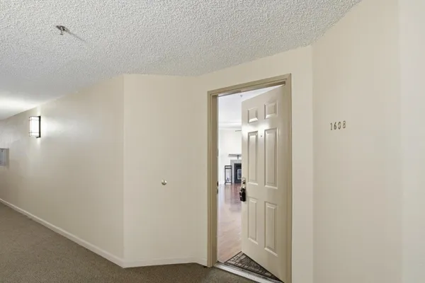 a view of a livingroom with wooden floor