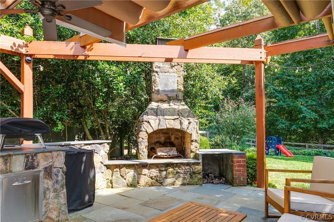 11907 Reeds Bluff Lane Midlothian, VA 23113 - Photo 46 of 50 Wood-burning stone fireplace for those chilly fall