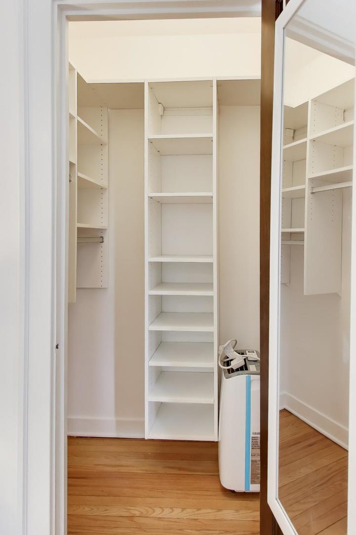 1929 Sherman Avenue, Unit 2W Evanston, IL 60201 - Photo 17 of 26 a view of walk in closet with empty racks