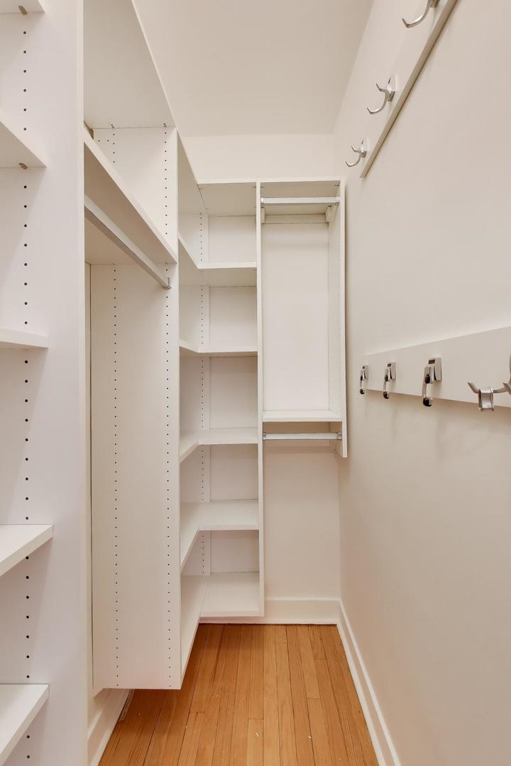 1929 Sherman Avenue, Unit 2W Evanston, IL 60201 - Photo 18 of 26 a view of walk in closet with empty racks