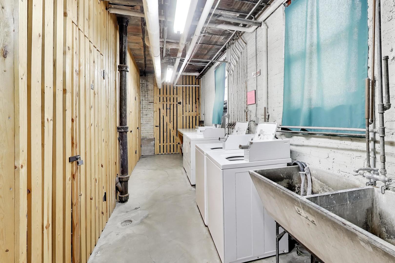 1929 Sherman Avenue, Unit 2W Evanston, IL 60201 - Photo 20 of 26 a kitchen with a sink and refrigerator