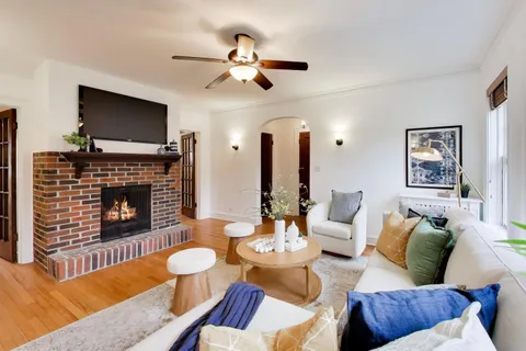 a kitchen with stainless steel appliances granite countertop a refrigerator sink and stove