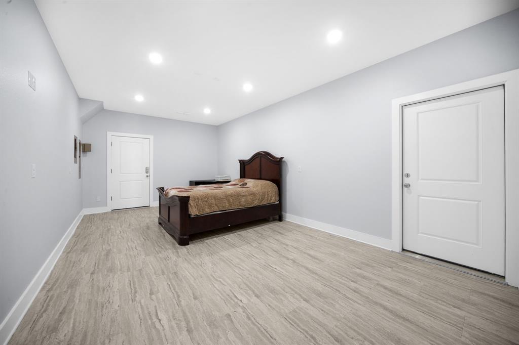 10405 Singleton Road Midlothian, TX 76065 - Photo 22 of 39 Bedroom with light wood-type flooring and recessed lighting