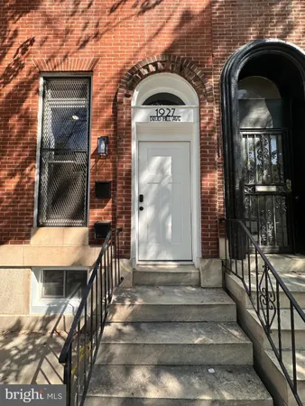 a view of entryway with a front door