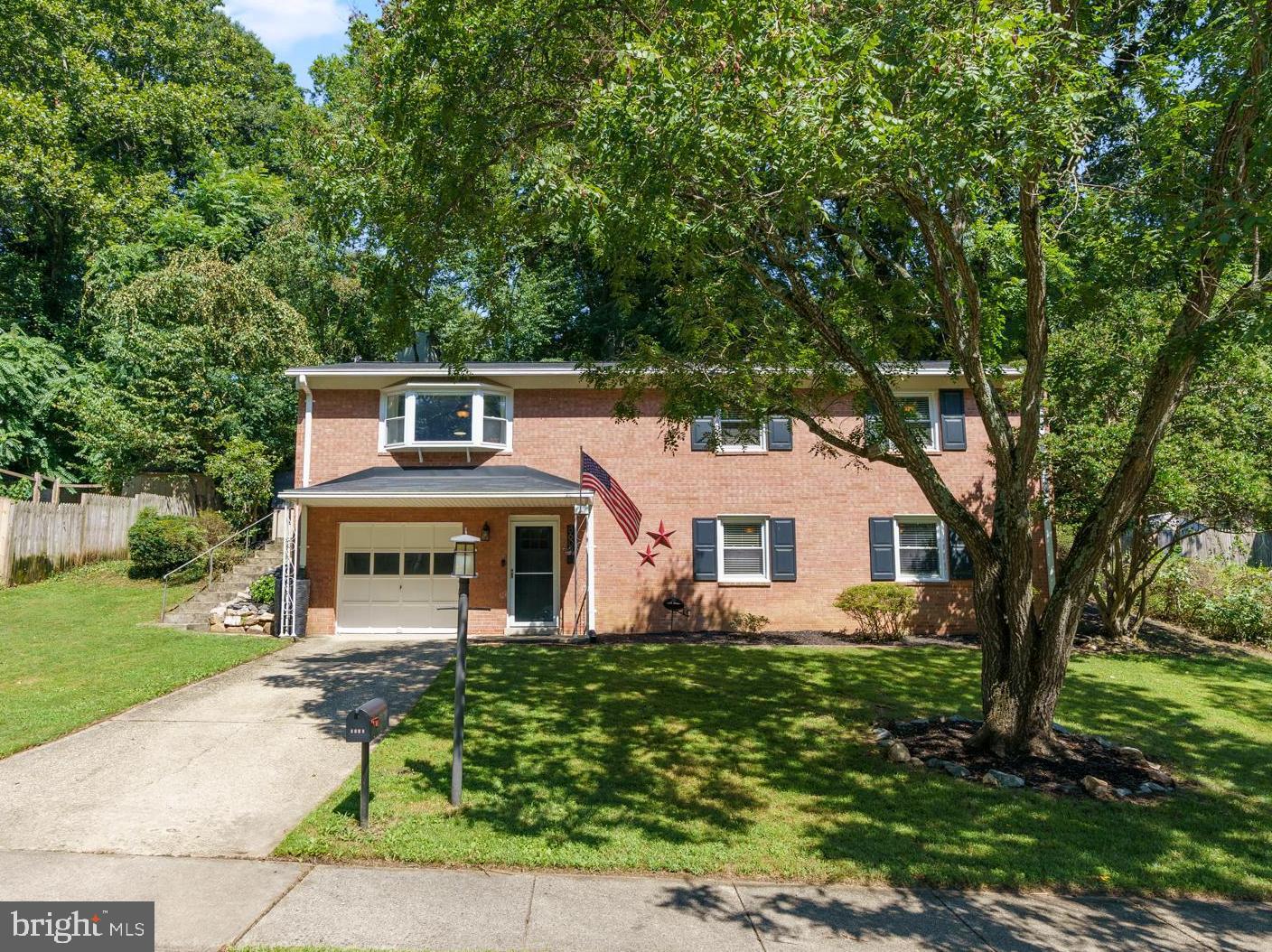 8608 Langport Drive Springfield, VA 22152 - Photo 1 of 43 a front view of a house with a yard