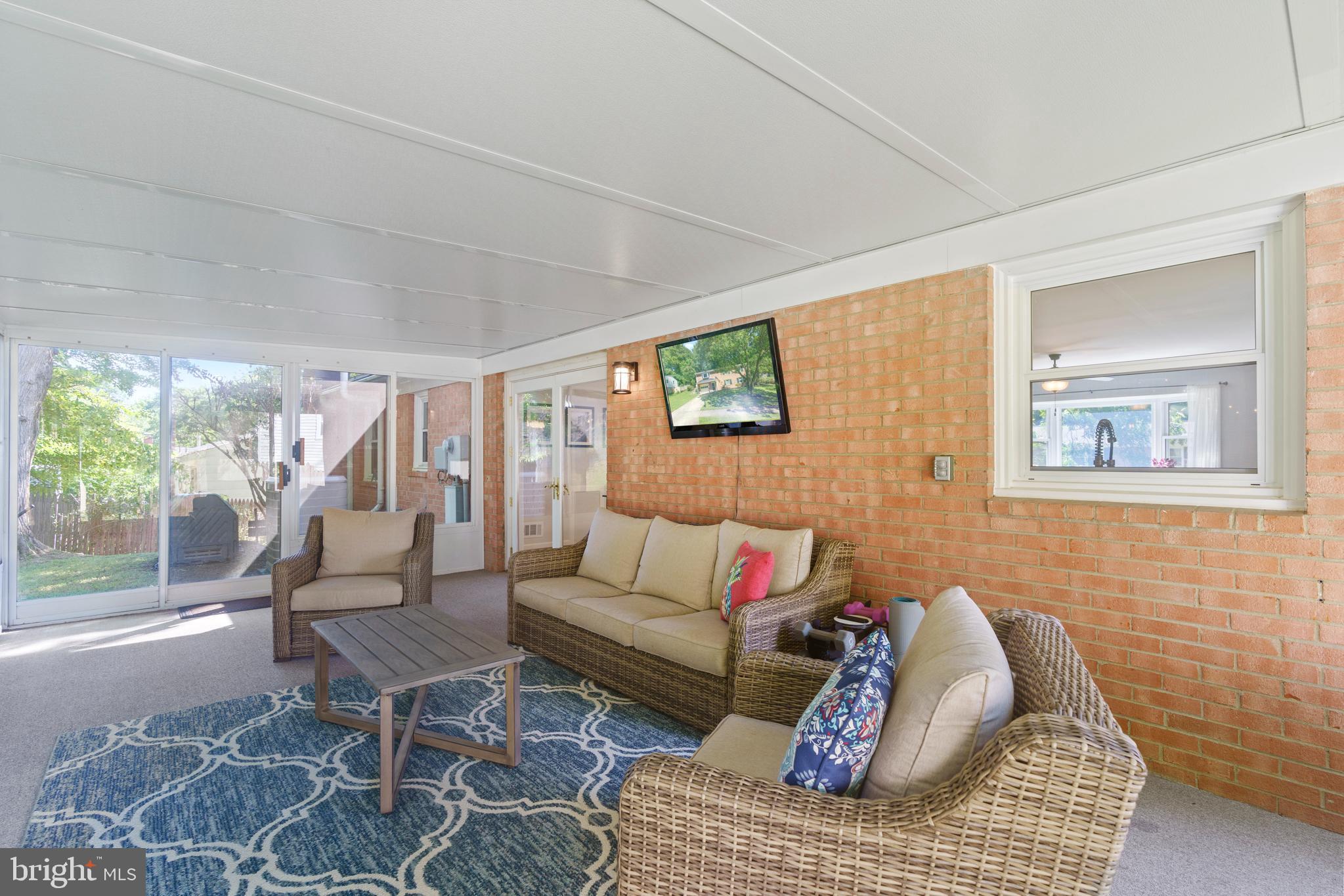 8608 Langport Drive Springfield, VA 22152 - Photo 13 of 43 a living room with furniture and a large window