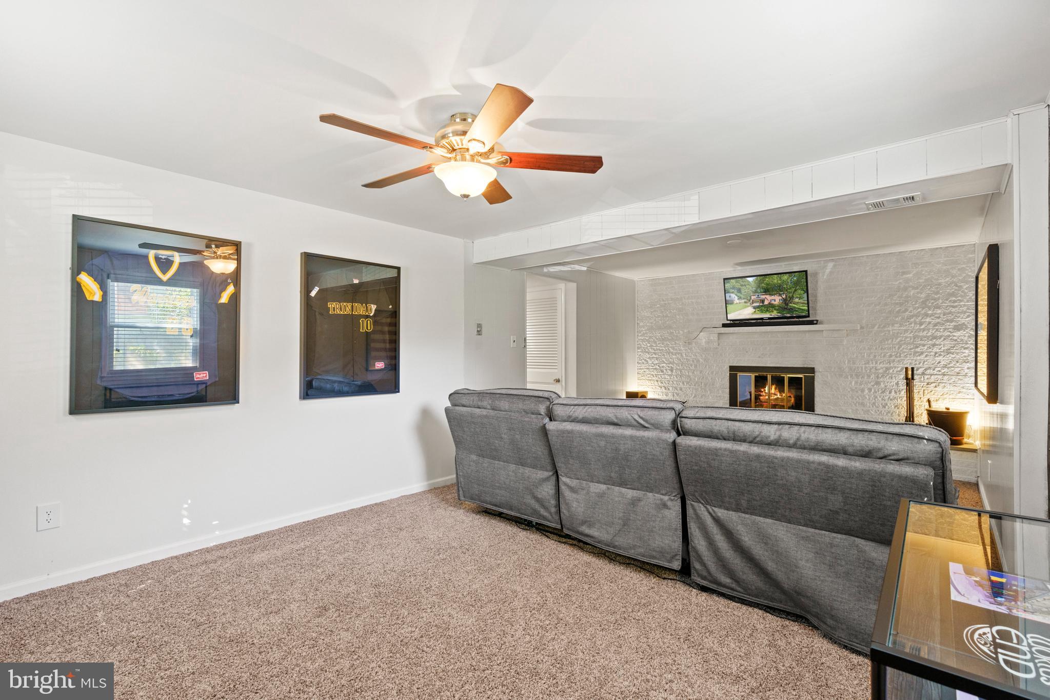 8608 Langport Drive Springfield, VA 22152 - Photo 29 of 43 a living room with furniture and a large window