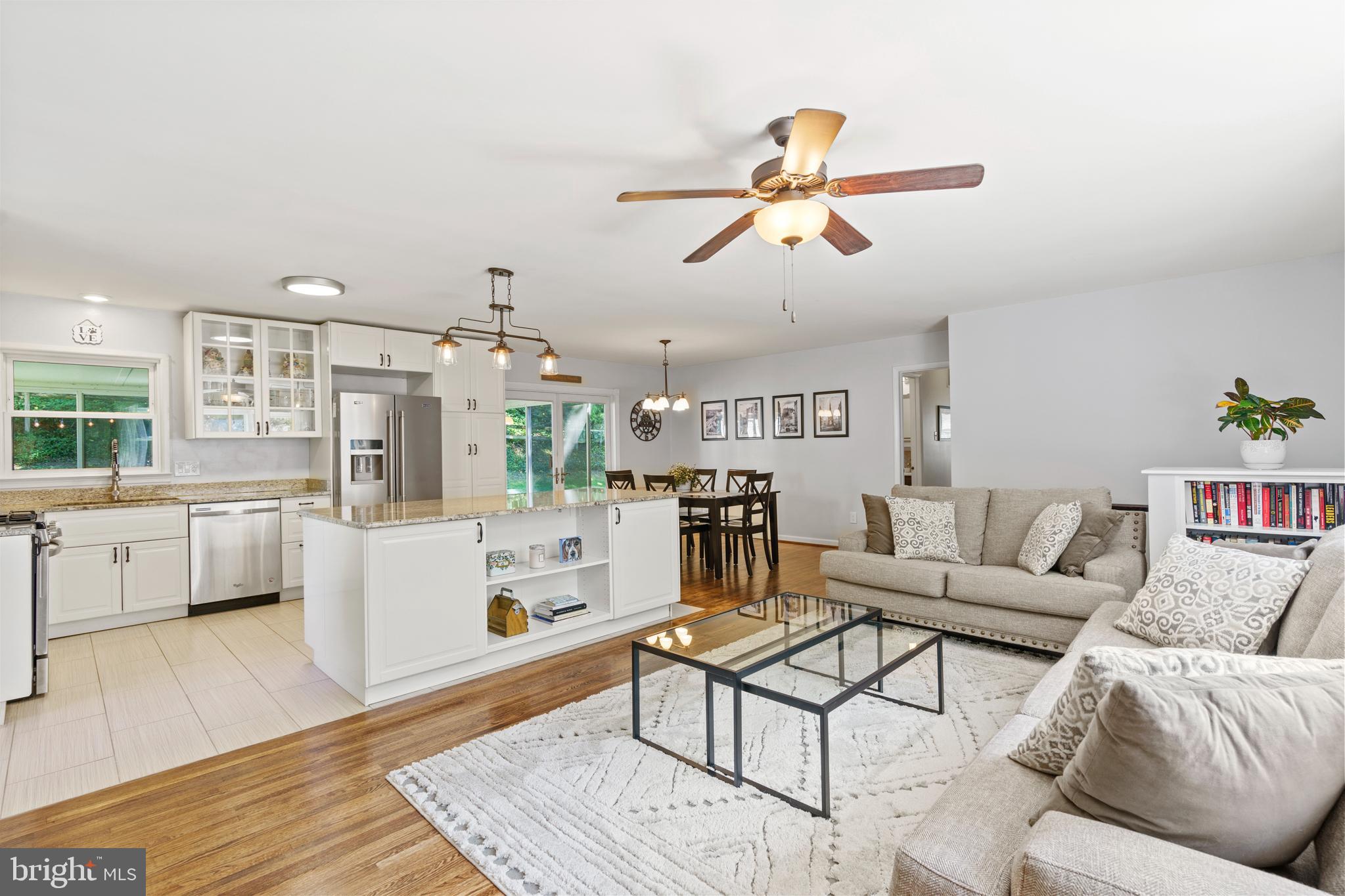 8608 Langport Drive Springfield, VA 22152 - Photo 3 of 43 a living room with furniture and a wooden floor