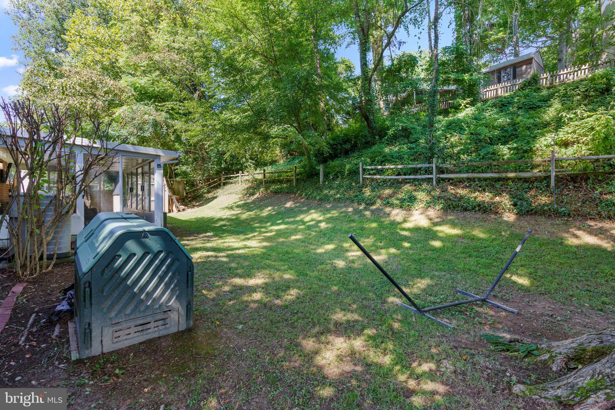 8608 Langport Drive Springfield, VA 22152 - Photo 38 of 43 a view of backyard with table and chairs and potted plants