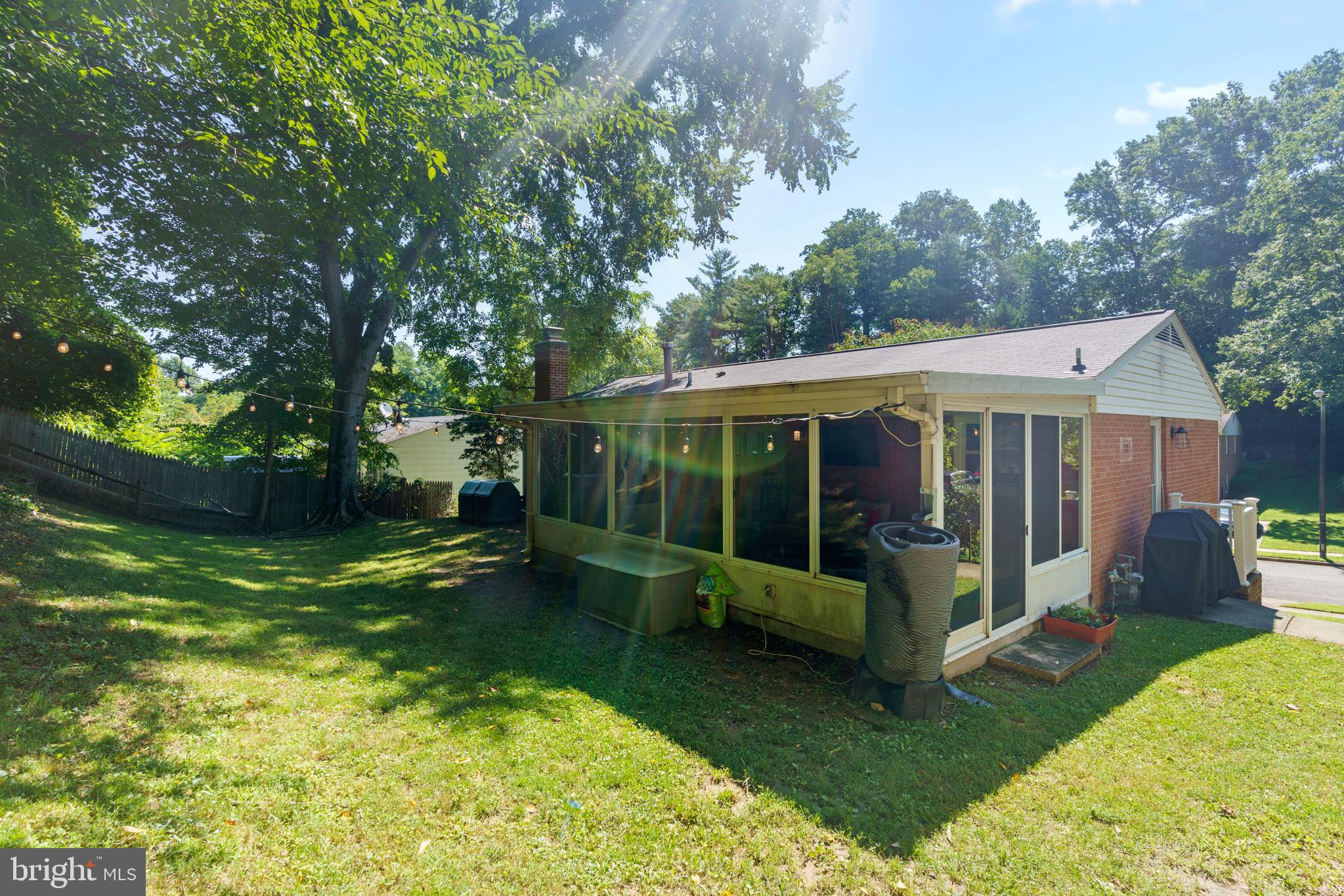 8608 Langport Drive Springfield, VA 22152 - Photo 42 of 43 a view of a house with backyard porch and sitting area