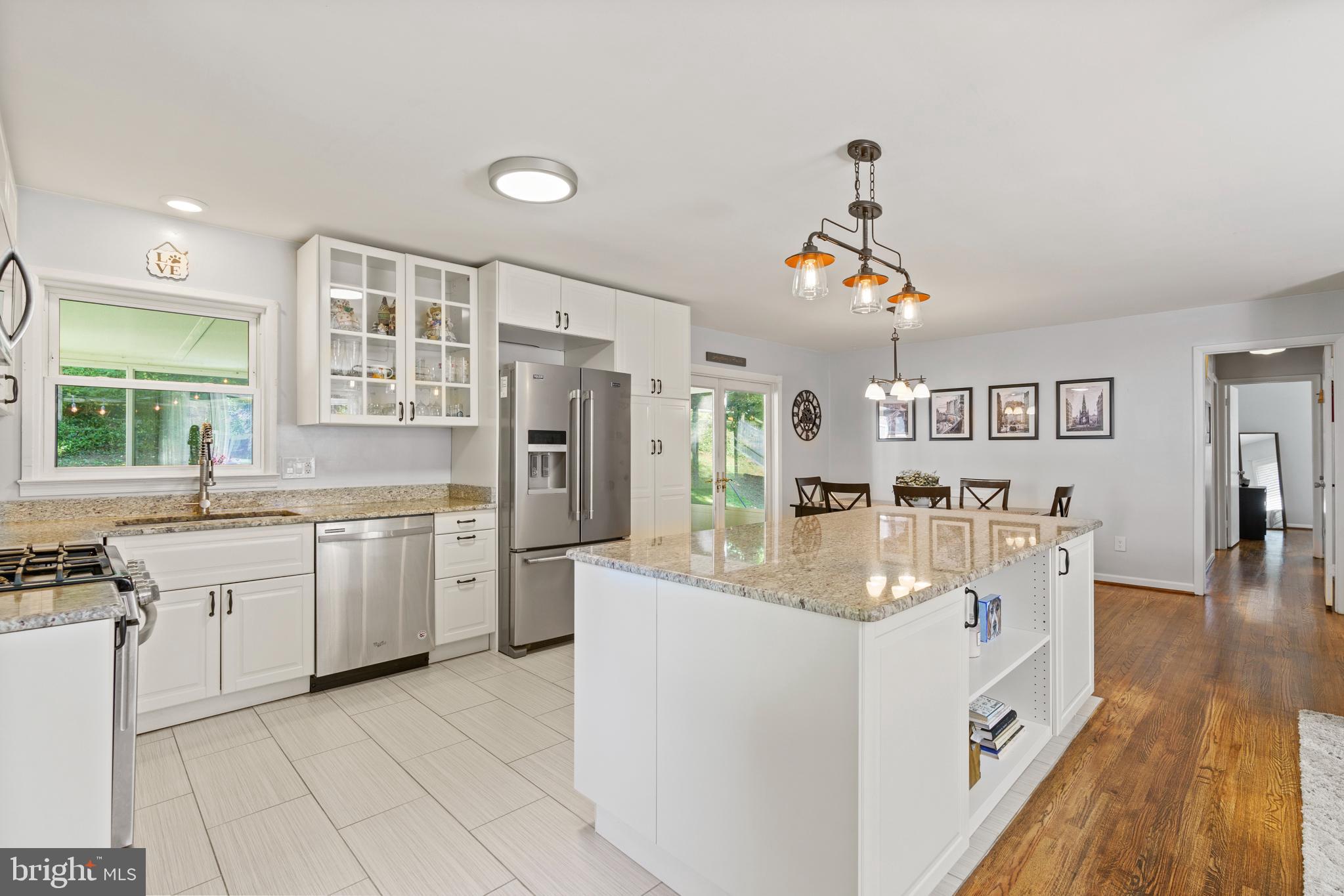 8608 Langport Drive Springfield, VA 22152 - Photo 6 of 43 a very nice looking kitchen with a lot of counter space and a wooden floor